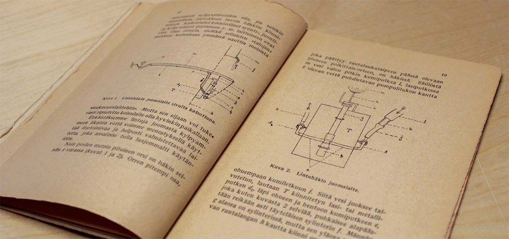 Piirros juoma-aparaatista kirjassa.